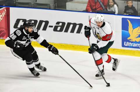 BOISBRIAND, QC: Benoit-Olivier Groulx #19 of the Halifax Mooseheads skates the puck against Ryan DaSilva #26 of the Blainville-Boisbriand Armada during the QMJHL game on October 20, 2017. (Photo by Minas Panagiotakis/Getty Images)