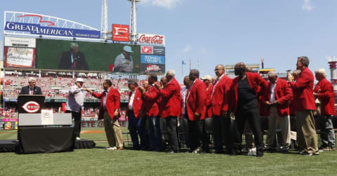 Jun 25, 2016; Cincinnati, OH, USA; Cincinnati Reds great Rose (second from left) is applauded by fellow inductees during his Reds Hall of Fame induction ceremony prior to a game with the San Diego Padres at Great American Ball Park. Mandatory Credit: David Kohl-USA TODAY Sports