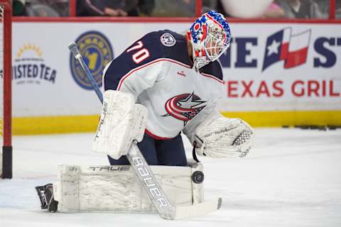 Jan 3, 2023; Ottawa, Ontario, CAN; Columbus Blue Jackets goalie Joonas Korpisalo (70) warms up prior to the start of game against the Ottawa Senators at the Canadian Tire Centre. Mandatory Credit: Marc DesRosiers-USA TODAY Sports