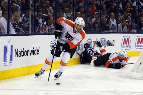 Dec 19, 2015; Columbus, OH, USA; Philadelphia Flyers center Sean Couturier (14) skates with the puck against the Columbus Blue Jackets during the second period at Nationwide Arena. Mandatory Credit: Russell LaBounty-USA TODAY Sports