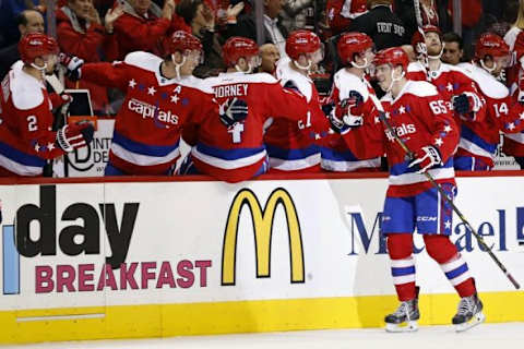 Feb 4, 2016; Washington, DC, USA; Washington Capitals left wing Andre Burakovsky (65) celebrates with teammates after scoring a goal against the New York Islanders in the second period at Verizon Center. Mandatory Credit: Geoff Burke-USA TODAY Sports