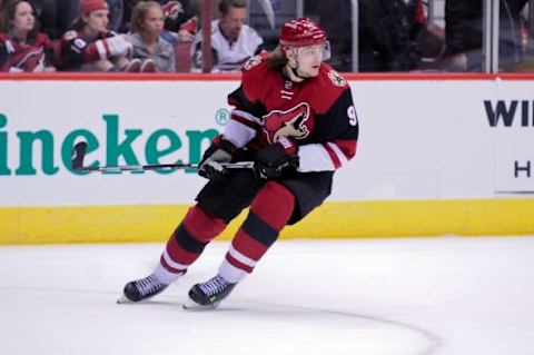 Dec 17, 2015; Glendale, AZ, USA; Arizona Coyotes left wing Viktor Tikhonov (9) looks on during the second period against the Columbus Blue Jackets at Gila River Arena. Mandatory Credit: Matt Kartozian-USA TODAY Sports