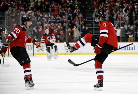 Dougie Hamilton #7 of the New Jersey Devils celebrates his overtime goal. (Photo by Bruce Bennett/Getty Images)