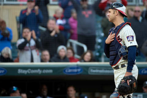 MINNEAPOLIS, MN – SEPTEMBER 30: Joe Mauer #7 of the Minnesota Twins acknowledges the fans as walks onto the field to catch at the start of the ninth inning against the Chicago White Sox during the game on September 30, 2018 at Target Field in Minneapolis, Minnesota. (Photo by Hannah Foslien/Getty Images)