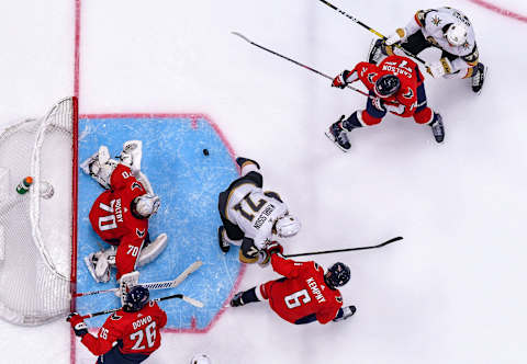 WASHINGTON, DC – NOVEMBER 09: Washington Capitals goaltender Braden Holtby (70) makes a second period save on shot by Vegas Golden Knights right wing Ryan Reaves (75) who is defended by defenseman John Carlson (74) on November 9, 2019, at the Capital One Arena in Washington, D.C. (Photo by Mark Goldman/Icon Sportswire via Getty Images)