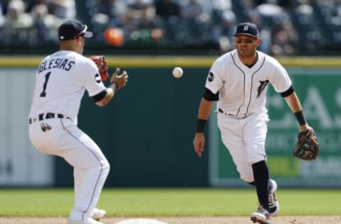 Apr 27, 2017; Detroit, MI, USA; Detroit Tigers second baseman Ian Kinsler (right) tosses the ball to shortstop Jose Iglesias (1) to turn the double play during the sixth inning against the Seattle Mariners at Comerica Park. Mandatory Credit: Raj Mehta-USA TODAY Sports