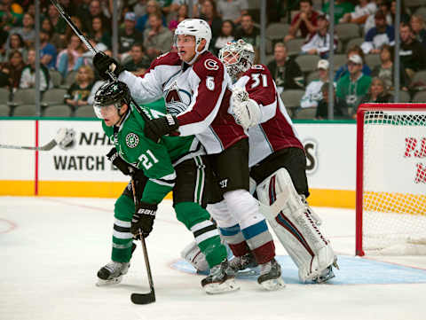 Oct 5, 2016; Dallas, TX, USA; Colorado Avalanche defenseman Erik Johnson (6) and goalie Calvin Pickard (31) defend against Dallas Stars left wing Antoine Roussel (21) during the second period at the American Airlines Center. Mandatory Credit: Jerome Miron-USA TODAY Sports