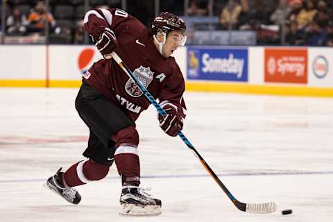 TORONTO, ON – DECEMBER 30: Assistant Captain forward Martins Dzierkals #10 of Team Latvia slapshots the puck against Team Slovakia in a preliminary round – Group B game during the IIHF World Junior Championship on December 30, 2016 at the Air Canada Centre in Toronto, Canada. (Photo by Adam Pulicicchio/Getty Images)