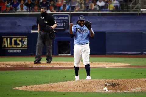 Diego Castillo of the Tampa Bay Rays reacts after retiring the side against the Houston Astros during the eighth inning in game one of the American League Championship Series at PETCO Park on October 11, 2020 in San Diego, California. (Photo by Ezra Shaw/Getty Images)