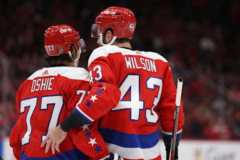 WASHINGTON, DC – FEBRUARY 10: T.J. Oshie #77 of the Washington Capitals and Tom Wilson #43 of the Washington Capitals look on against the New York Islanders during the second period at Capital One Arena on February 10, 2020 in Washington, DC. (Photo by Patrick Smith/Getty Images)