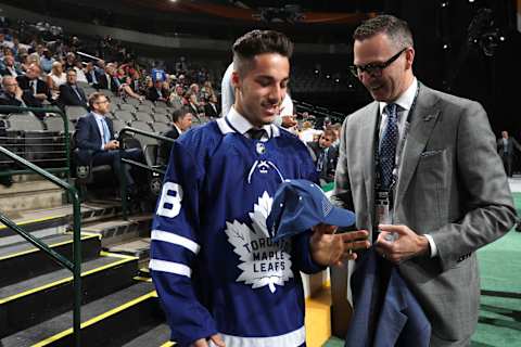 DALLAS, TX – JUNE 23: Sean Durzi reacts after being selected 52nd overall by the Toronto Maple Leafs during the 2018 NHL Draft at American Airlines Center on June 23, 2018 in Dallas, Texas. (Photo by Bruce Bennett/Getty Images)