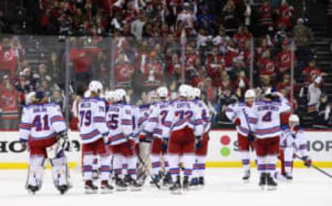 NEWARK, NEW JERSEY – MAY 01: The New York Rangers pause following their 4-0 defeat at the hands of the New Jersey Devils in Game Seven of the First Round of the 2023 Stanley Cup Playoffs at Prudential Center on May 01, 2023, in Newark, New Jersey. (Photo by Bruce Bennett/Getty Images)