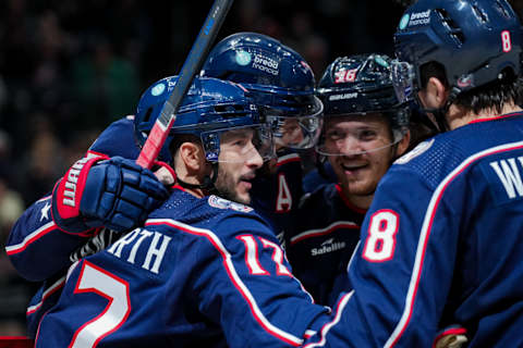 Oct 20, 2023; Columbus, Ohio, USA; Columbus Blue Jackets right wing Justin Danforth (17) celebrates with teammates after scoring a goal against the Calgary Flames in the third period at Nationwide Arena. Mandatory Credit: Aaron Doster-USA TODAY Sports