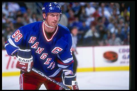 13 Dec 1996: Center Wayne Gretzky of the New York Rangers looks on during a game against the Buffalo Sabres at the Marine Midland Arena in Buffalo, New York. The Rangers won the game, 3-0.