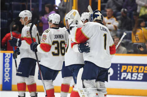 Feb 11, 2017; Nashville, TN, USA; Florida Panthers goalie Roberto Luongo (1) celebrates with teammates after defeating the Nashville Predators 7-4 at Bridgestone Arena. Mandatory Credit: Christopher Hanewinckel-USA TODAY Sports