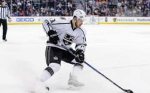 Feb 21, 2017; Denver, CO, USA; Los Angeles Kings left wing Kyle Clifford (13) controls the puck in the first period against the Colorado Avalanche at the Pepsi Center. Mandatory Credit: Isaiah J. Downing-USA TODAY Sports