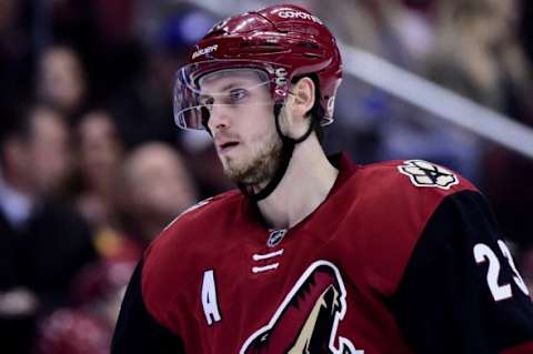 Jan 23, 2016; Glendale, AZ, USA; Arizona Coyotes defenseman Oliver Ekman-Larsson (23) looks on during the second period against the Los Angeles Kings at Gila River Arena. Mandatory Credit: Matt Kartozian-USA TODAY Sports