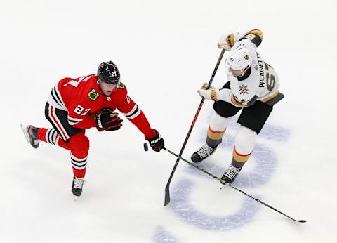 Max Pacioretty #67 of the Vegas Golden Knights skates against Adam Boqvist #27 of the Chicago Blackhawks during the third period in Game Three of the Western Conference First Round. (Photo by Jeff Vinnick/Getty Images)