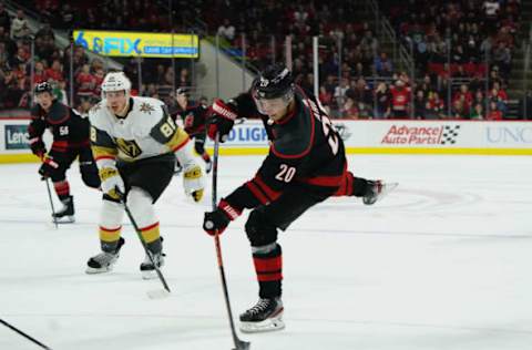 RALEIGH, NC – JANUARY 31: Sebastian Aho #20 of the Carolina Hurricanes fires a slap shot during an NHL game against the Vegas Golden Knights on January 31, 2020 at PNC Arena in Raleigh, North Carolina. (Photo by Gregg Forwerck/NHLI via Getty Images)