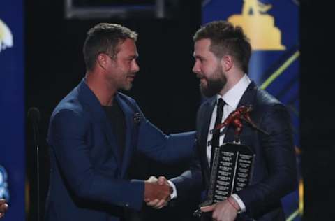 LAS VEGAS, NEVADA – JUNE 19: Actor Taylor Kinney presents Nikita Kucherov of the Tampa Bay Lightning the Ted Lindsay Award given to the NHL’s most outstanding player as voted by fellow members of the NHL’s Player Association during the 2019 NHL Awards at the Mandalay Bay Events Center on June 19, 2019 in Las Vegas, Nevada. (Photo by Dave Sandford/NHLI via Getty Images)