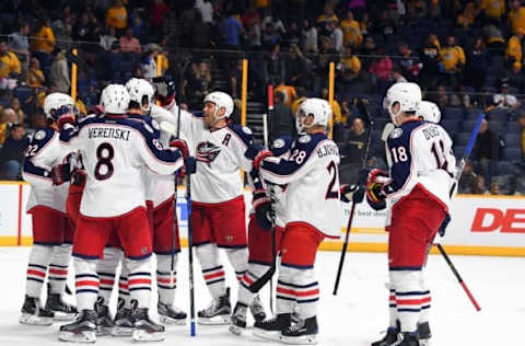 Oct 4, 2016; Nashville, TN, USA; Columbus Blue Jackets players celebrate following an overtime win during a preseason hockey game against Nashville Predators at Bridgestone Arena. The Blue Jackets won 3-2 in overtime. Mandatory Credit: Christopher Hanewinckel-USA TODAY Sports