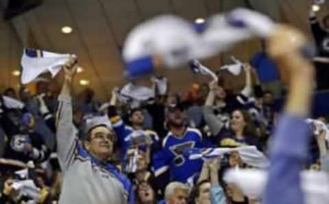 Apr 18, 2015; St. Louis, MO, USA; St. Louis Blues fans waive rally towels during the game between the St. Louis Blues and the Minnesota Wild during the first period in game two of the first round of the the 2015 Stanley Cup Playoffs at Scottrade Center. Mandatory Credit: Jasen Vinlove-USA TODAY Sports