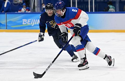 Slovakia’s Simon Nemec (R). (Photo by ANTHONY WALLACE / AFP)