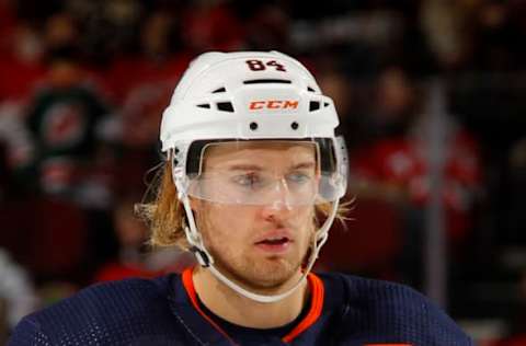 NEWARK, NEW JERSEY – DECEMBER 31: William Lagesson #84 of the Edmonton Oilers in action against the New Jersey Devils at Prudential Center on December 31, 2021, in Newark, New Jersey. The Devils defeated the Oilers 6-5 in overtime. (Photo by Jim McIsaac/Getty Images)