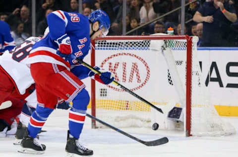 NEW YORK, NY – APRIL 05: New York Rangers Right Wing Pavel Buchnevich (89) tries to control a loose puck in front of The Columbus Blue Jackets goal during the first period of the National Hockey League game between the Columbus Blue Jackets and the New York Rangers on April 5, 2019 at Madison Square Garden in New York, NY. (Photo by Joshua Sarner/Icon Sportswire via Getty Images)