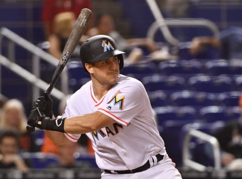 MIAMI, FL – SEPTEMBER 20: J.T. Realmuto #11 of the Miami Marlins at bat against the Cincinnati Reds at Marlins Park on September 20, 2018 in Miami, Florida. (Photo by Mark Brown/Getty Images)