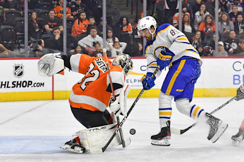 Apr 1, 2023; Philadelphia, Pennsylvania, USA; Philadelphia Flyers goaltender Felix Sandstrom (32) makes a save against Buffalo Sabres right wing Alex Tuch (89) during the third period at Wells Fargo Center. Mandatory Credit: Eric Hartline-USA TODAY Sports