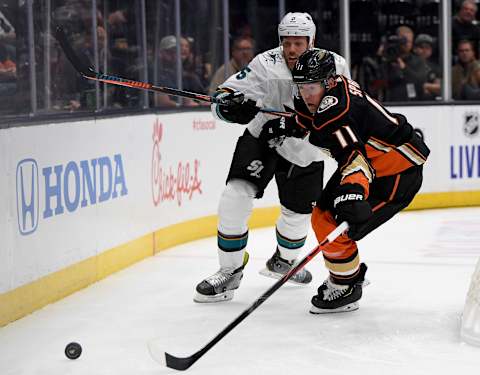 ANAHEIM, CALIFORNIA – SEPTEMBER 24: Daniel Sprong #11 of the Anaheim Ducks and Dalton Prout #5 of the San Jose Sharks chase after the puck during the first period in a preseason game at Honda Center on September 24, 2019, in Anaheim, California. (Photo by Harry How/Getty Images)