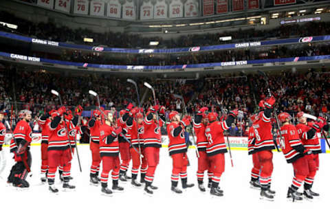 RALEIGH, NC – FEBRUARY 16: Members of the Carolina Hurricanes celebrate a victory over the Dallas Stars as they participate in a Storm Surge Celebratiion following an NHL game on February 16, 2019 at PNC Arena in Raleigh, North Carolina. (Photo by Gregg Forwerck/NHLI via Getty Images)