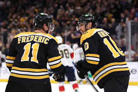 BOSTON, MASSACHUSETTS – OCTOBER 17: Trent Frederic #11 of the Boston Bruins celebrates with A.J. Greer #10 after scoring a goal against the Florida Panthers during the third period at TD Garden on October 17, 2022 in Boston, Massachusetts. The Bruins defeat the Panthers 5-3. (Photo by Maddie Meyer/Getty Images)