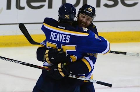 Nov 15, 2016; St. Louis, MO, USA; St. Louis Blues center Kyle Brodziak (28) celebrates with right wing Ryan Reaves (75) after scoring against the Buffalo Sabres during the third period at Scottrade Center. The Blues won 4-1. Mandatory Credit: Jeff Curry-USA TODAY Sports