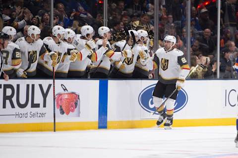 UNIONDALE, NY – DECEMBER 05: Vegas Golden Knights Teammates hi five Vegas Golden Knights Right Wing Alex Tuch (89) for scoring a goal during the second period of the National Hockey League game between the Las Vegas Golden Knights and the New York Islanders on December 5, 2019, at the Nassau Veterans Memorial Coliseum in Uniondale, NY. (Photo by Gregory Fisher/Icon Sportswire via Getty Images)