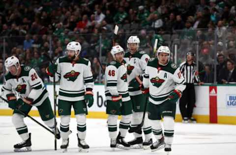 DALLAS, TEXAS – OCTOBER 29: (L-R) Ryan Suter #20 of the Minnesota Wild celebrates his goal with Jason Zucker #16, Jared Spurgeon #46, Mikko Koivu #9, and Zach Parise #11 of the Minnesota Wild against the Dallas Stars in the second period at American Airlines Center on October 29, 2019 in Dallas, Texas. (Photo by Ronald Martinez/Getty Images)