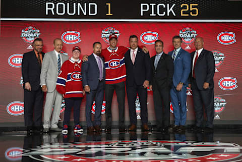 CHICAGO, IL – JUNE 23: (L-R) Assistant general manager Rick Dudley, Bill Berglund, draft runner Jake Timmins, VP of player personnel Trevor Timmins, 25th overall pick Ryan Poehling, director of amateur scouting Shane Churla, owner/president Geoff Molson, executive VP of and general manager Marc Bergevin and head coach Claude Julien of the Montreal Canadiens pose for a photo onstage during Round One of the 2017 NHL Draft at United Center on June 23, 2017 in Chicago, Illinois. (Photo by Dave Sandford/NHLI via Getty Images)