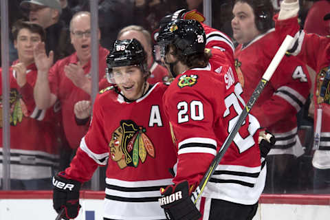 CHICAGO, IL – MARCH 29: Patrick Kane #88 and Brandon Saad #20 of the Chicago Blackhawks celebrate after Saad scored against the Winnipeg Jets in the first period at the United Center on March 29, 2018 in Chicago, Illinois. (Photo by Bill Smith/NHLI via Getty Images)