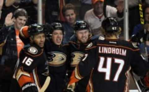 Mar 4, 2015; Anaheim, CA, USA; Anaheim Ducks center Rickard Rakell (67) celebrates with teammates Emerson Etem (16), Jiri Sekac (46) and Hampus Lindholm (47) after scoring a goal in the second period against the Montreal Canadiens at Honda Center. Mandatory Credit: Kirby Lee-USA TODAY Sports