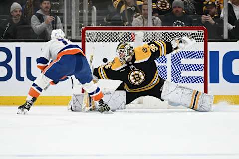 BOSTON, MASSACHUSETTS – DECEMBER 13: Mathew Barzal #13 of the New York Islanders scores a goal on Linus Ullmark #35 of the Boston Bruins during an overtime shootout at the TD Garden on December 13, 2022 in Boston, Massachusetts. (Photo by Brian Fluharty/Getty Images)