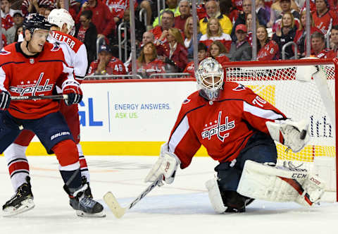 WASHINGTON, DC – APRIL 20: Washington Capitals goaltender Braden Holtby (70) makes a second period save on a shot by Carolina Hurricanes right wing Nino Niederreiter (21) on April 20, 2019, at the Capital One Arena in Washington, D.C. in the first round of the Stanley Cup Playoffs. (Photo by Mark Goldman/Icon Sportswire via Getty Images)