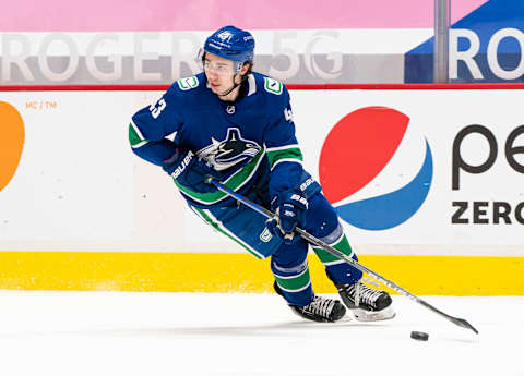 VANCOUVER, BC – MARCH 22: Quinn Hughes #43 of the Vancouver Canucks skates during NHL action against the Winnipeg Jets at Rogers Arena on March 22, 2021 in Vancouver, Canada. (Photo by Rich Lam/Getty Images)