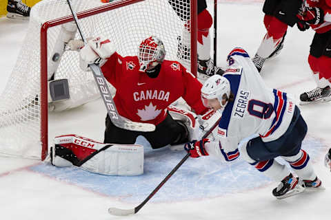 EDMONTON, AB – JANUARY 05: Goaltender Devon Levi #1 of Canada defends Trevor Zegras #9 of the United States during the 2021 IIHF World Junior Championship gold medal game at Rogers Place on January 5, 2021 in Edmonton, Canada. (Photo by Codie McLachlan/Getty Images)