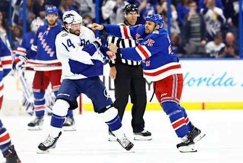 Mar 19, 2022; Tampa, Florida, USA; Tampa Bay Lightning left wing Pat Maroon (14) and New York Rangers right wing Ryan Reaves (75) fight during the third period at Amalie Arena. Mandatory Credit: Kim Klement-USA TODAY Sports