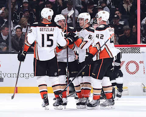 LOS ANGELES, CA – SEPTEMBER 29: Ryan Getzlaf #15, Rickard Rakell #67, Troy Terry #61 and Josh Manson #42 of the Anaheim Ducks celebrate Terry’s first-period goal during the preseason game against the Los Angeles Kings at STAPLES Center on September 29, 2018, in Los Angeles, California. (Photo by Juan Ocampo/NHLI via Getty Images)