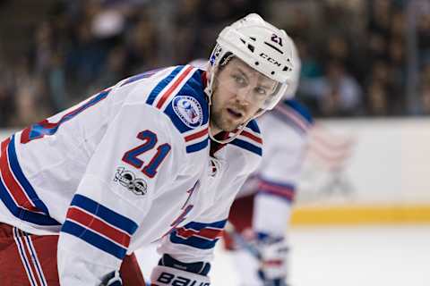 Mar 28, 2017; San Jose, CA, USA; New York Rangers center Derek Stepan (21) faces off against the San Jose Sharks in the second period at SAP Center at San Jose. Mandatory Credit: John Hefti-USA TODAY Sports