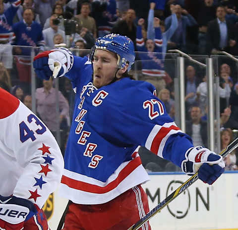 Ryan McDonagh #27 of the New York Rangers (r) celebrates his game winning goal at 9:37 of overtime. (Photo by Bruce Bennett/Getty Images)