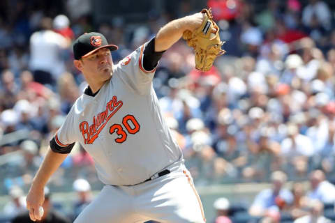 Jul 21, 2016; Bronx, NY, USA; Baltimore Orioles starting pitcher Chris Tillman (30) pitches during the first inning against the New York Yankees at Yankee Stadium. Mandatory Credit: Anthony Gruppuso-USA TODAY Sports