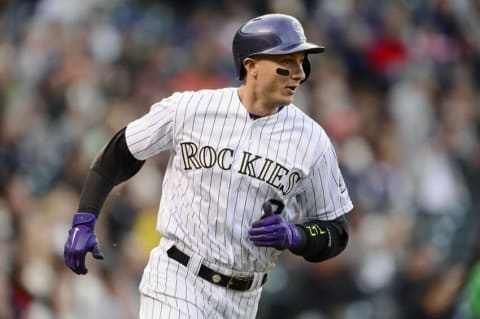 Apr 25, 2015; Denver, CO, USA; Colorado Rockies shortstop Tulowitzki (2) runs following his single base hit in the first inning against the San Francisco Giants at Coors Field. Mandatory Credit: Ron Chenoy-USA TODAY Sports